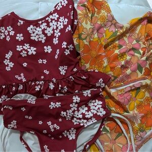 Lot of 2 girls swim suits size 7. Saint ida long sleeve and wildling Tankini.